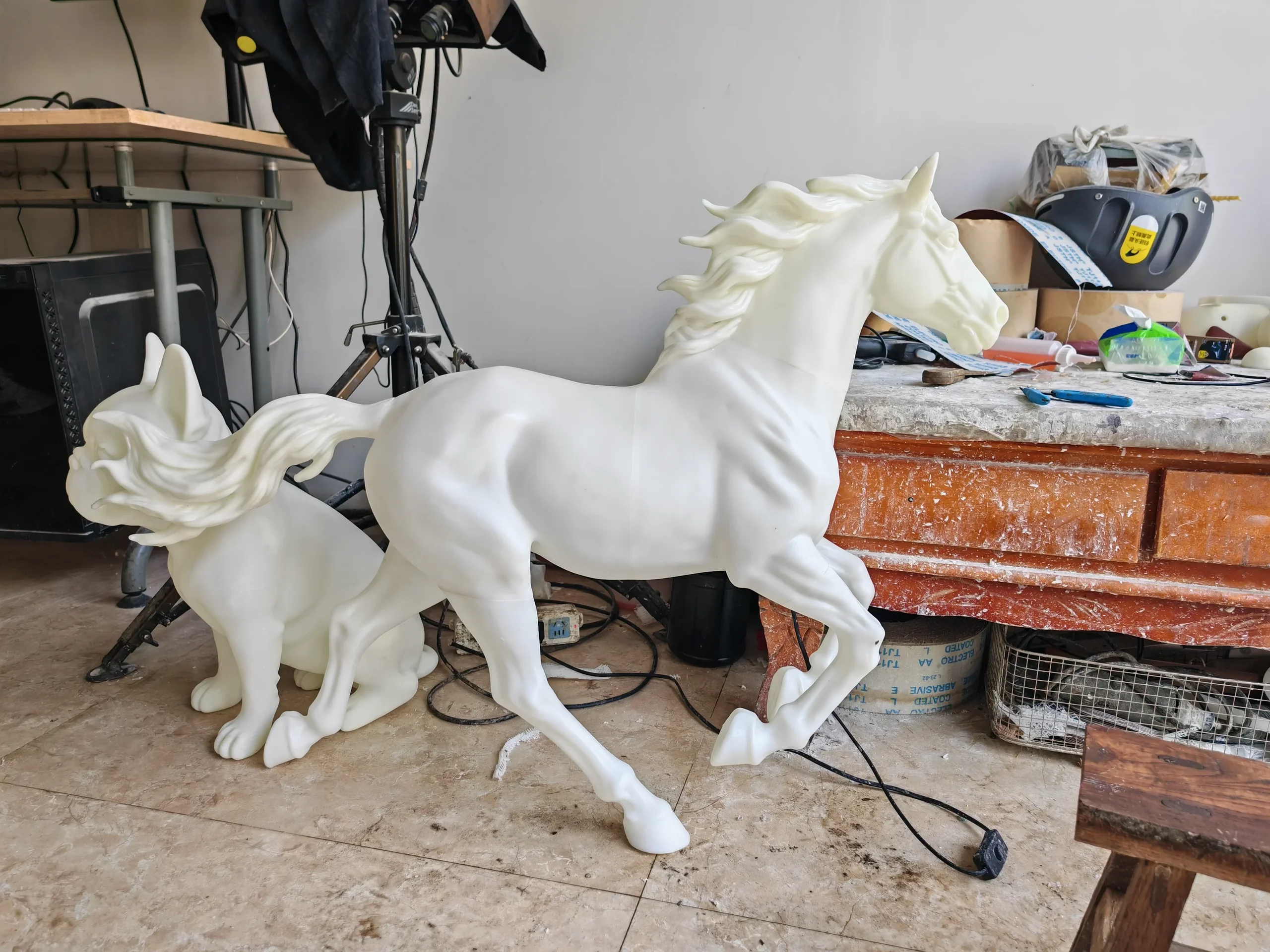 Plaster model of a bronze horse sculpture in a workshop