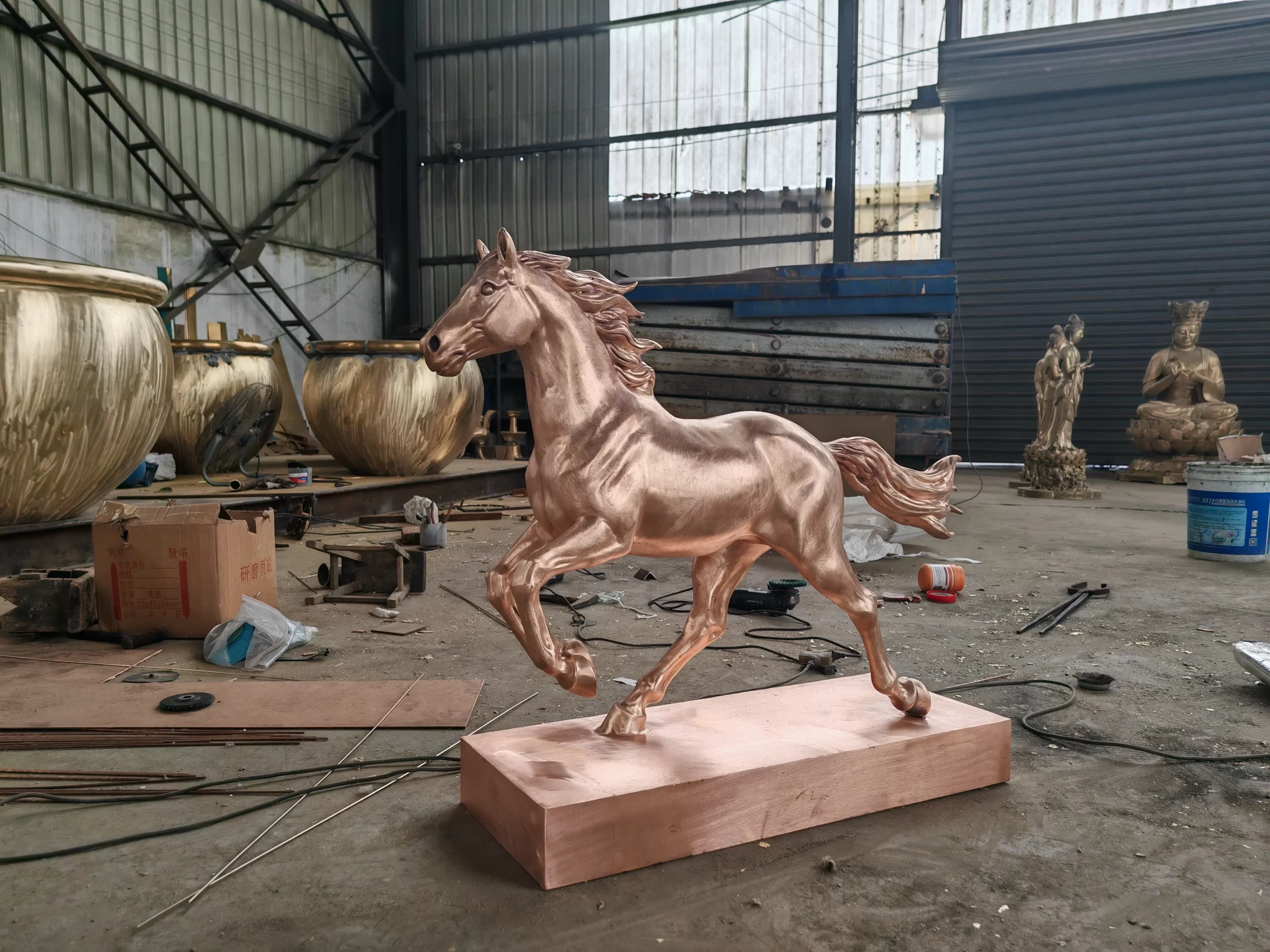 Assembled bronze horse sculpture at the surface preparation stage